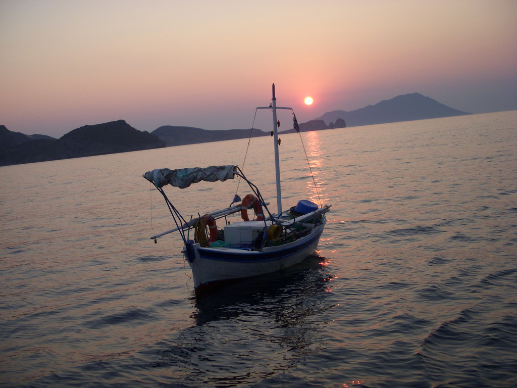 Milos Boat at Sunset Postcard